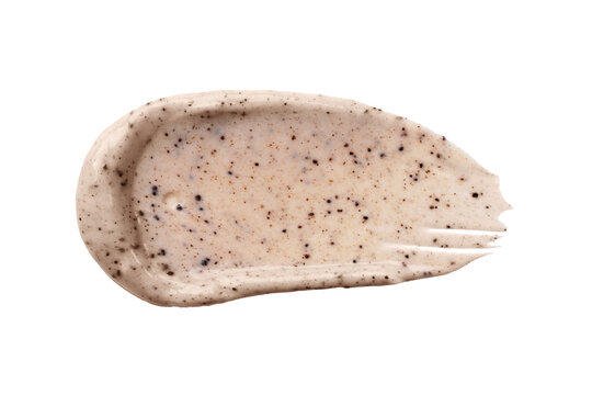 Face cream coffee scrub swatch isolated on transparent background. Cosmetic exfoliation product. Handmade coffee scrub for body care.