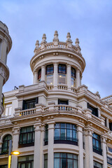 Building architectural capital in Gran Via, Madrid, Spain