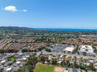 Fototapeta na wymiar Aerial view over houses and condos in San Diego and ocean on the background,, California, USA