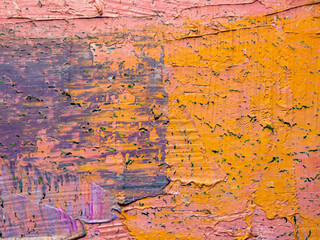 Colorful surface of the painting on canvas. Painting artwork facture. Colorful texture. Abstract background. Oil painting on canvas with orange, pink violet colors. 