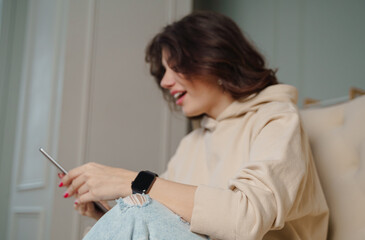 Portrait of woman happy smile looking digital tablet on blurred background.