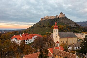 Aerial view about Bishop's Palace under the castle of Sumeg at sunset.