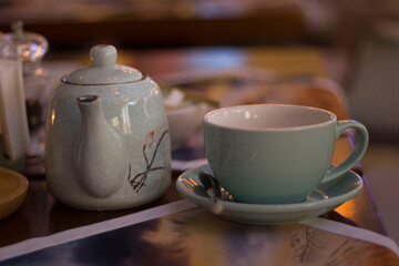 teapot and cup on the table
