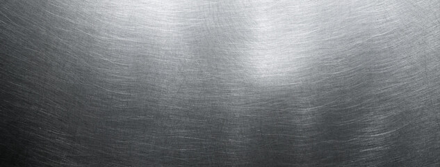 Real brushed stainless steel metal background.