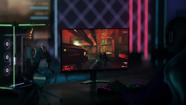 Player starting the level of the new special forces computer video game. Player killing the npc target on the computer game level. Player defusing the terrorist bomb to win a computer game level.