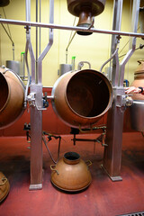Gin distillation process in copper tanks in Spanish bodega