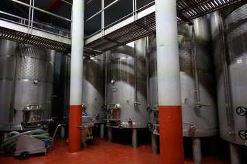 Modern bio wine production factory in Italy, inox steel tanks used for fermentation of wine grapes