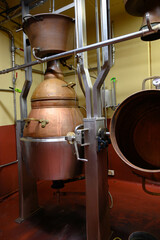 Gin distillation process in copper tanks in Spanish bodega
