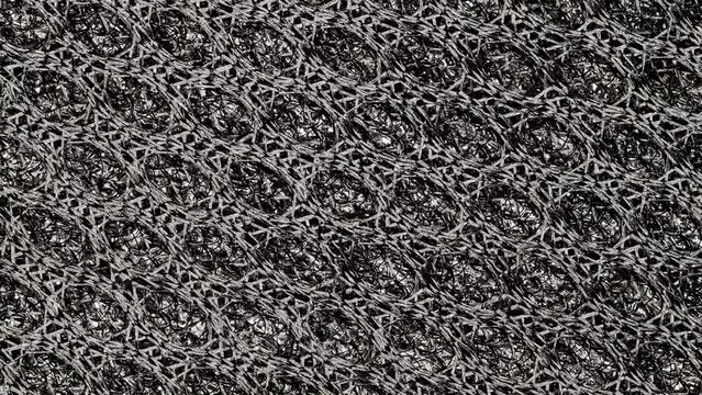 Mesh black polymer structure, rotating, turning, close-up, macro
