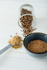 Group of Spices and coriander seeds spilling
