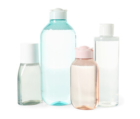 Bottles of micellar water on white background