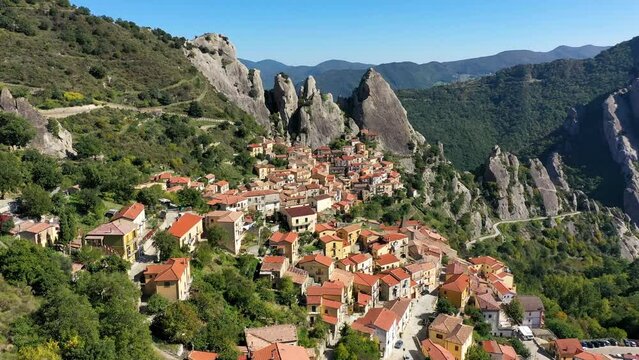 The picturesque village of Castelmezzano, province of Potenza, Basilicata, Italy. Cityscape aerial view of medieval city of Castelmazzano, Italy. Castelmezzano village in Apennines Dolomiti Lucane.