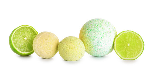 Bath bombs with lime on white background