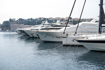 Fototapeta premium White yachts moored in the port.