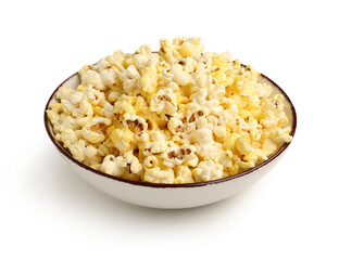 Bowl with crispy popcorn on white background