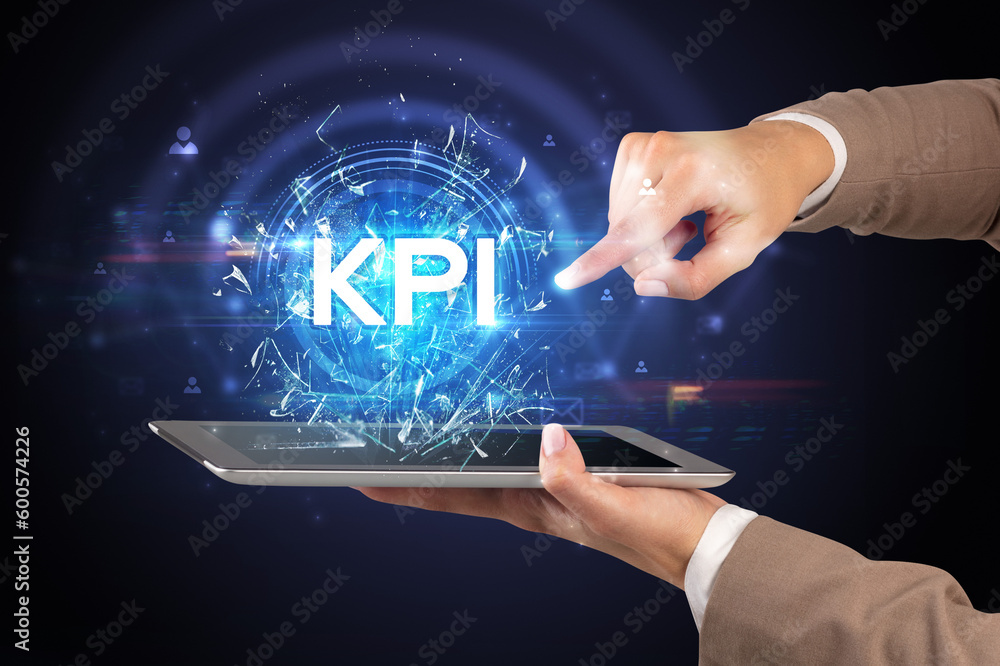 Poster close-up of a touchscreen with abbreviation.