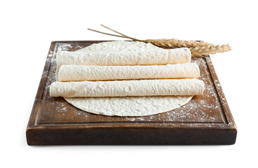 Wooden board with thin lavash and wheat spikelet on white background