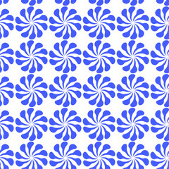 Seamless pattern with blue ornate shapes.