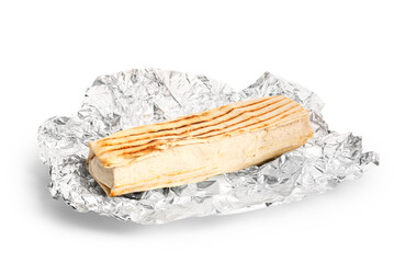 Tasty shawarma with foil on white background