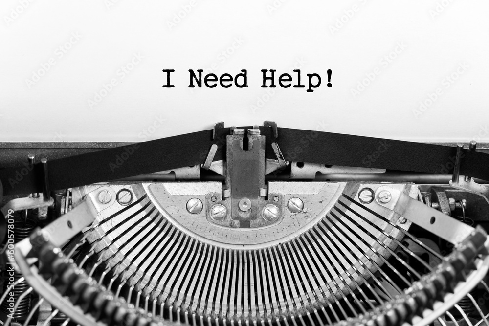 Fototapete I need help phrase closeup being typing and centered on a sheet of paper on old vintage typewriter mechanical