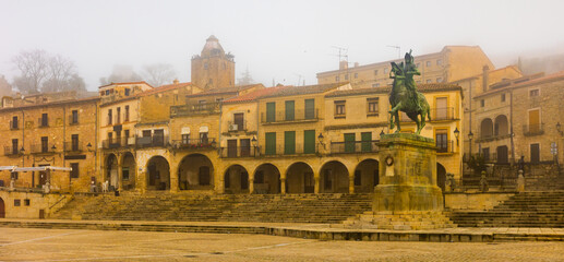 View of Plaza Mayor Square with an equestrian statue of Francisco Pizarro in the morning in Trujillo, Spain