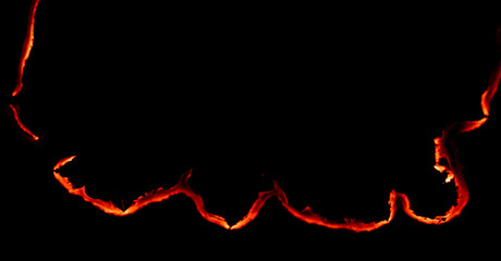 burning paper, glowing edge of paper on a black background