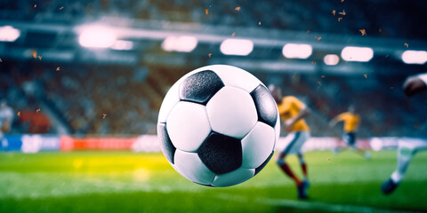 Close up of a soccer striker ready to kicks the ball in the football goal. Soccer scene at night...