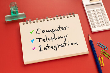 There is notebook with the word Computer Telephony Integration.It is as an eye-catching image.