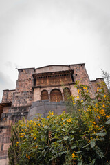 Obraz premium Outside Convent of Santo Domingo with gardens and ruins of Qorikancha Temple (Coricancha), City of Cusco, Peru
