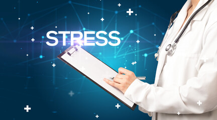 Doctor fills out medical record