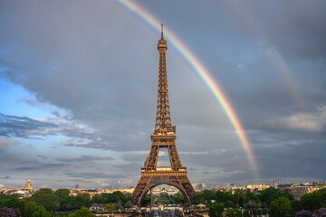Eiffel Tower with a rainbow after the rain 