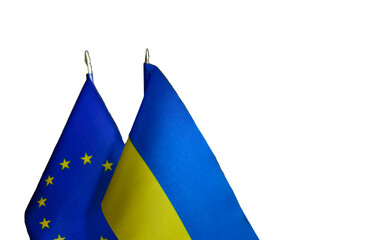 Flags of Ukraine and EU. partnerships between countries. Concept of Ukraine's accession to European Union. Close up.
