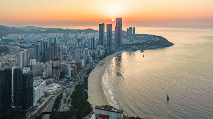 Sunrise Over Haeundae Beach and LCT The Sharp: Aerial View of Busan's Iconic Coastline