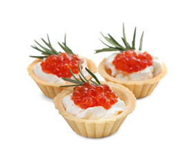 Delicious tartlets with red caviar and cream cheese on white background