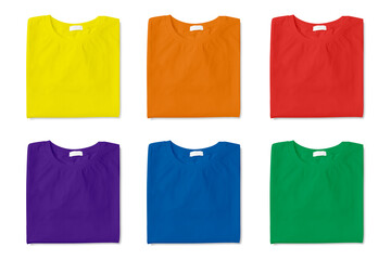 Set of bright stylish t-shirts on white background, top view