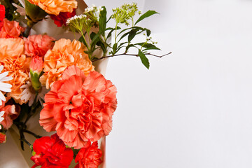 bouquet of carnations and daisies on a white background