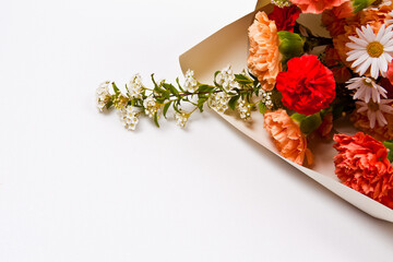 Bouquet of flowers on a white background with space for text