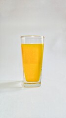 glass of orange juice with white background