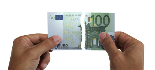 Torn money. Note of 100 euros. Currency of Europe destroyed. Conceptual idea of ​​wasting money.