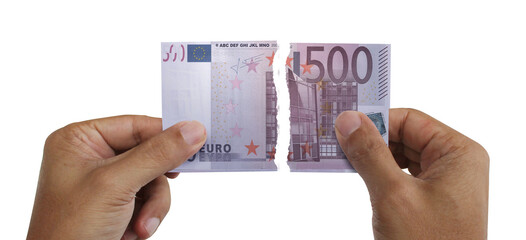 Torn money. Note of 500 euros. Currency of Europe destroyed. Conceptual idea of ​​wasting money.