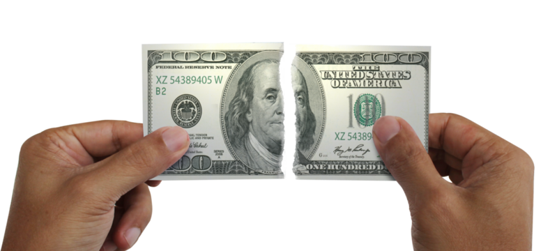 Torn money. Note of 100 dollars. Money destroyed. Conceptual idea of ​​wasting money.