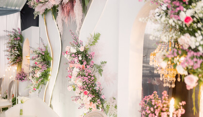 a collection of fake flowers or decorative flowers at weddings, pink, white, green, red flowers and others