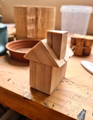 tinny wooden house with chimney, carpentering art