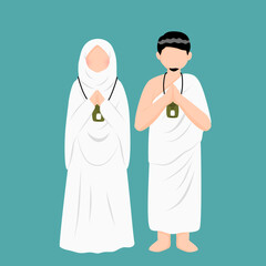 Muslim couple wearing ihram clothes while hajj