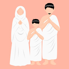 Muslim family wearing ihram clothes while hajj