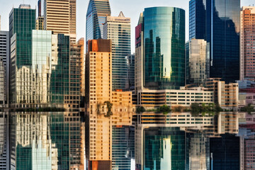 Obraz premium Reflections of the City Skyscrapers in Business District, Generative AI