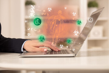 Doctor working on laptop with healthcare concept