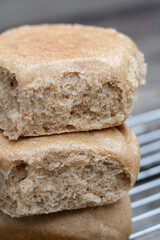 Stack of three fresh whole wheat rolls