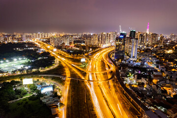 Sunset at overpass bridges in Cat Lai juntion, Ho Chi Minh city, Vietnam. Photos taken in April 2023.