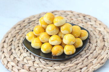 nastar cookies, pineapple tarts or nanas tart are small, bite-size pastries